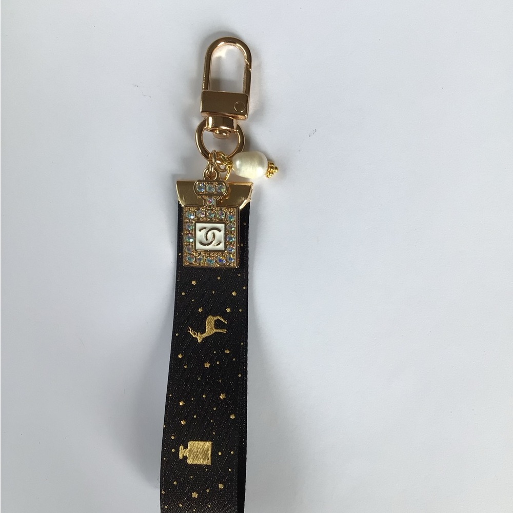 Elegant Black and Gold Designer Charm